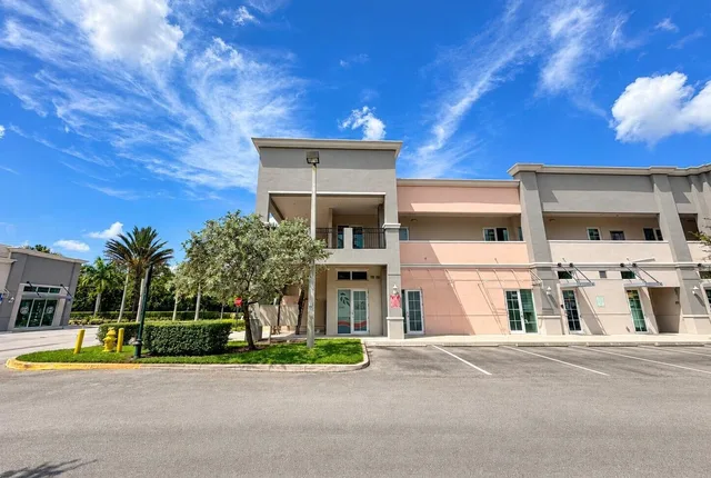 Exterior of the two-story commercial building at 2201 SW 101st Avenue in Miramar, Florida